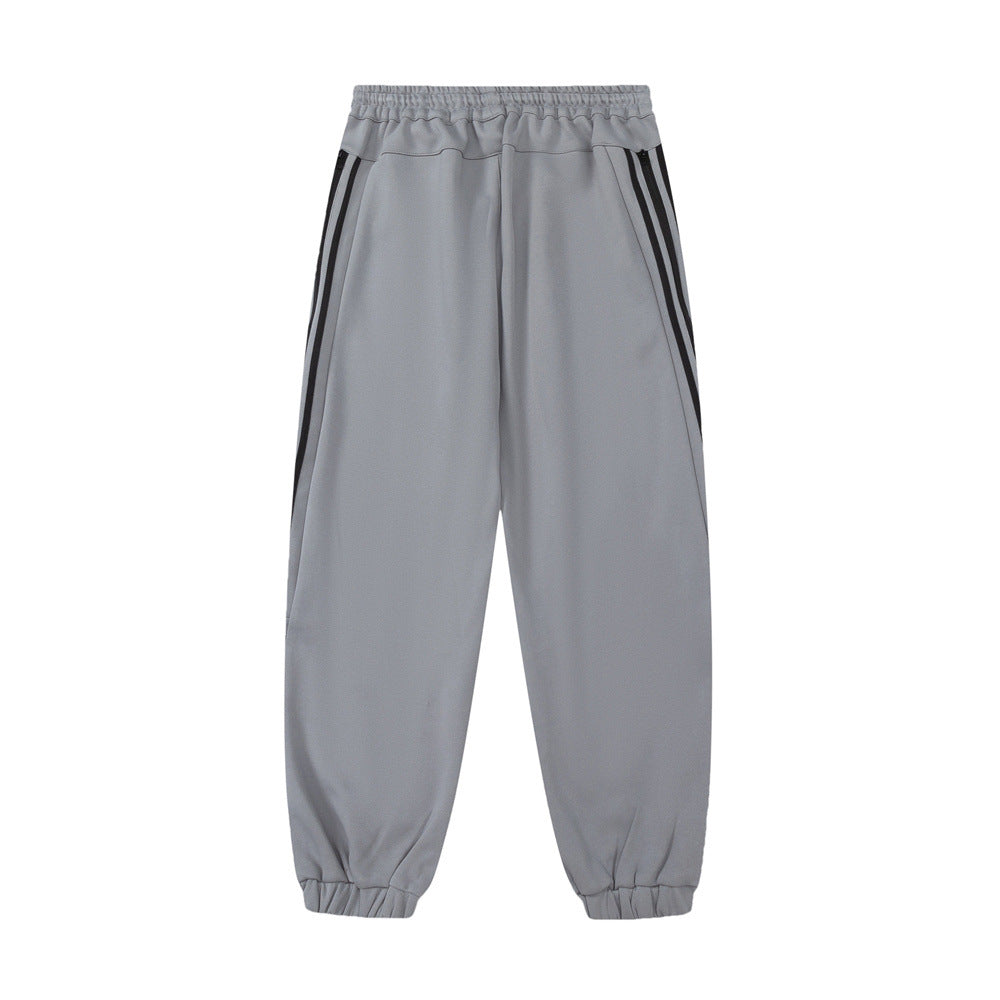 Men Sweatpants Sports Leisure Tappered Trousers with an Elasticated Waist Side Stripe Stitching Loose Zip Trousers